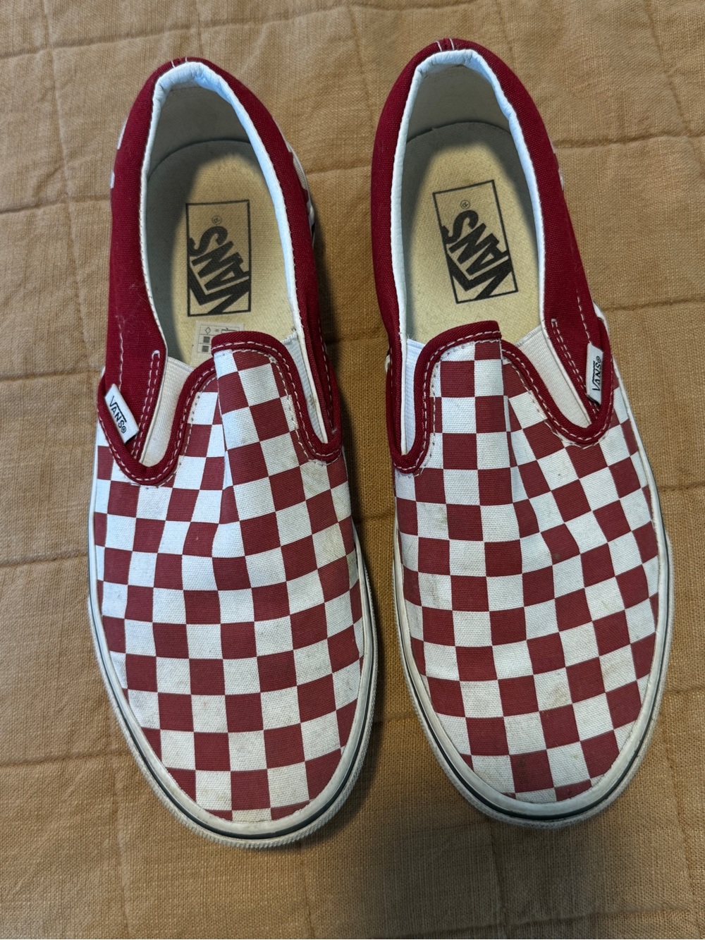 Vans checkered slip ons